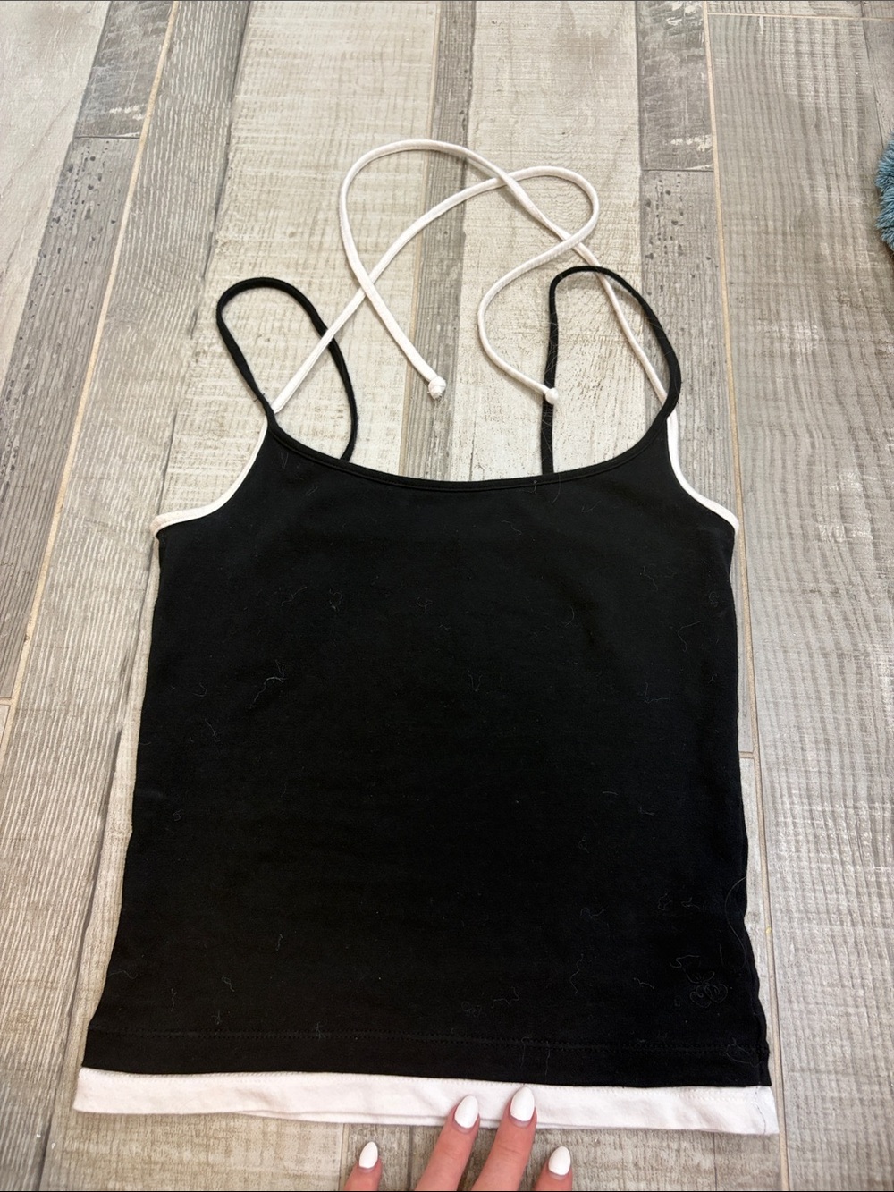 Out from under black and white tie top